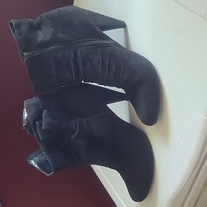 Mossimo black faux suede high heel booties with bow on side. Size 10